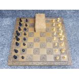 Carved wooden chess board + wooden pieces, complete with slide top storage box