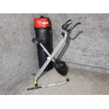 McGurk punchbag, exercise bike and Rawlings baseball bat