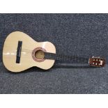 A Cleca acoustic guitar, made in India.