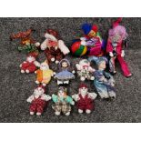 9 small clown dolls with porcelain heads