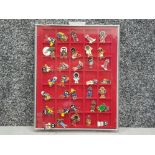 A total of 35 Robertson Jam Golly pin badges, in display case