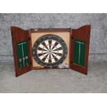 Dart board, darts and case