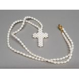 A freshwater pearl cross and bead necklet in Honora purse