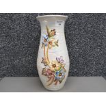 An Arthur Wood vase with raised floral decoration 33cm high