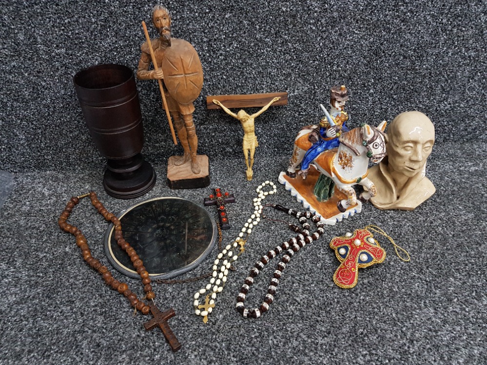 Box containing miscellaneous items including religious rosary beads, crucifix & hand carved wooden