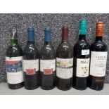 Six bottles of red wine to include Estevez Cab Sav, Merlot, and Corbieres.