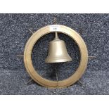 A brass nautical theme bell 28cm diameter