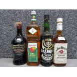 Four bottles of alcohol to include Jim Beam, Apple Schnapps etc