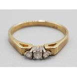 Ladies 9ct yellow gold three stone diamond ring 2g gross size O