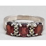 Silver three stone garnet and marcasite ring size Q 4.6g gross
