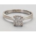 Ladies 18ct white gold solitaire ring, comprising of a radiant cut diamond set in a fair claw