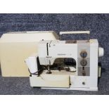 A Bernina matic 910 electronic sewing machine, cased.