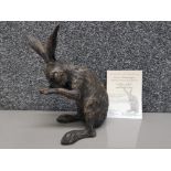 A limited edition bronze style sculpture by Stef Ottevanger "Small Hare" no 267/500 (repair) with