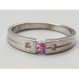 Ladies 9ct white gold pink stone & diamond ring set with a single pink stone in the centre,