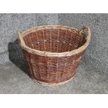 A two tone wicker log basket