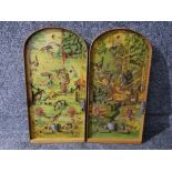 A pair of bagatelle boards with forest animal decorations