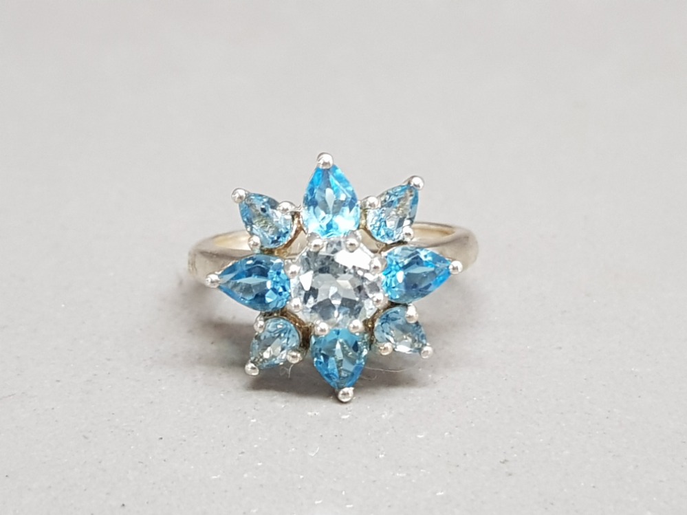 Silver and topaz cluster ring size q 3.9g gross