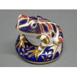 A Royal Crown Derby paperweight of a frog with gold stopper