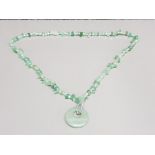 Jade bead necklet with round jade pendant