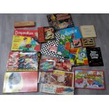 Box containing 20 different vintage games, including compendium of games, jump que, chinese chequers