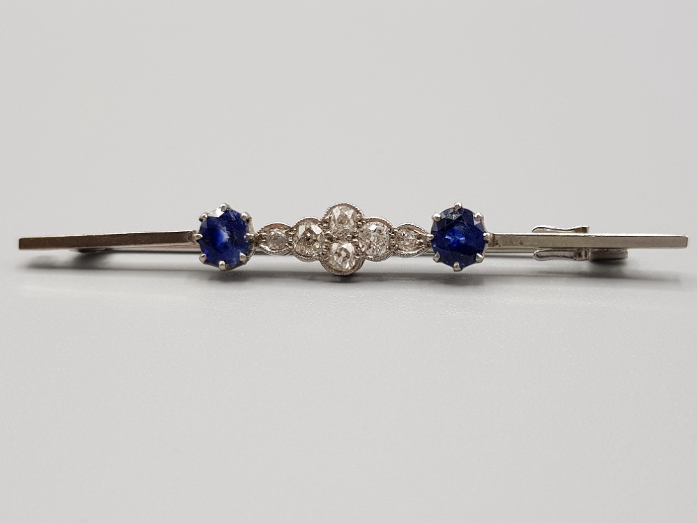 Ladies antique white gold blue stone and diamond brooch two blue stones and six diamonds