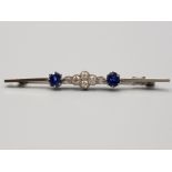 Ladies antique white gold blue stone and diamond brooch two blue stones and six diamonds