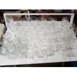 A quanity of drinking glasses to include two liqueur glasses by Waterford crystal