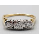 Ladies 18ct yellow gold three stone diamond ring size K1/2 2.8g gross