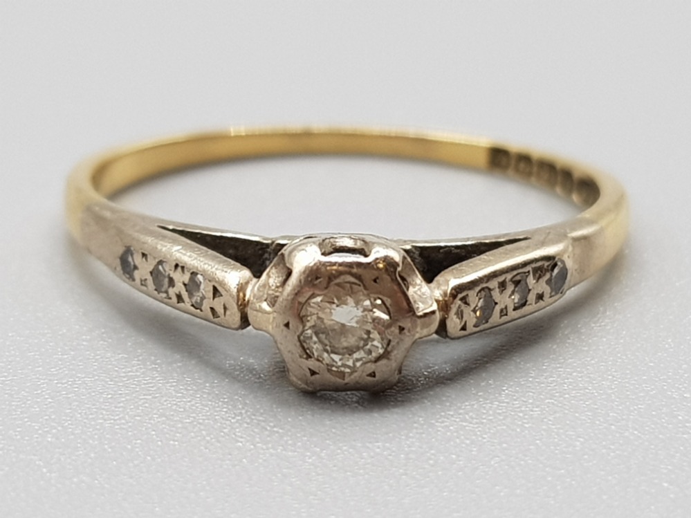 Ladies 18ct yellow gold diamond ring comprising of a diamond set in the centre with 3 diamonds set