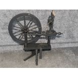 Matt ebonised antique spinning wheel