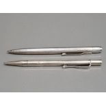 A silver cased pen and propelling pencil inscribed Eileen Warwick