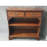 A reproduction inlaid mahogany bookcase with two drawers 77 x 76.5 x 27.5cm