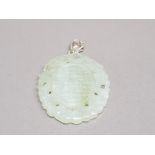 Carved jade pendant with silver pendant