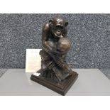 A bronze effect sculpture by Creations "Darwin's Mistake" with certificate