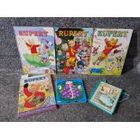 Six vintage children's books including Rupert Bear and Cinderella