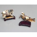 A pair of early 20th century carved ivory horses on wooden plinths (damages)