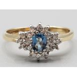 Ladies 9ct yellow gold blue topaz and diamond cluster ring size O 2.7g gross