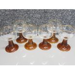 Set of 6 nicely etched drinking glasses with amber coloured bases