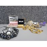 A box of assorted costume jewellery