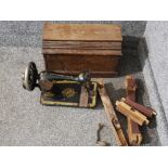 A singer sewing machine with original wooden box (poor condition)