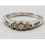 Ladies 18ct white gold diamond three stone ring size L 3g gross