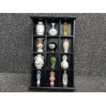 Hanging Wooden 12 section display stand containing 12 different oriental style minature vases