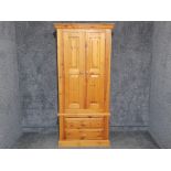 Large pine double door wardrobe fitted with two drawers, 91x57cm, height 180cm