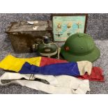 Military items to include ammo box with helmet, naval flashes and framed reproductions of