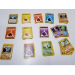 Early edition Pokemon playing cards to include trainer, energy and two shiny Mewtwo and Gyarados