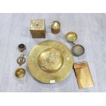 Brassware to include a circular wall plaque, horse brass, dishes etc