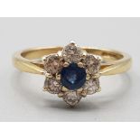 Ladies 9ct yellow gold sapphire and diamond cluster ring size M 2.6g gross