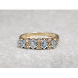 9ct yellow gold aquamarine and diamond ring size o 2.7g gross