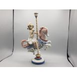 Lladro figure 1469 girl on carousel horse (damage repaired at base)