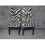 Pair of upholstered zebra pattern dining chairs